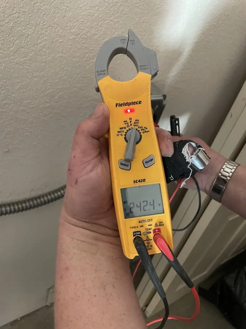 Voltage testing with clamp meter during Generator Installation in Milltown